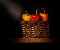 BASKET WITH PEPPERS by Paul Johnson